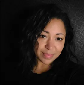 Nyna Gilpin in black shirt with black background