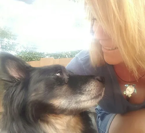 Stefanie Strackbein, owner and founder of What Dogs Want with her co-creator Indy.