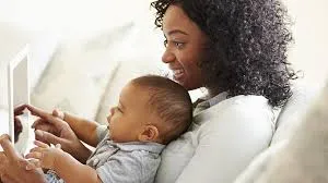 Image of mom holding infant child
