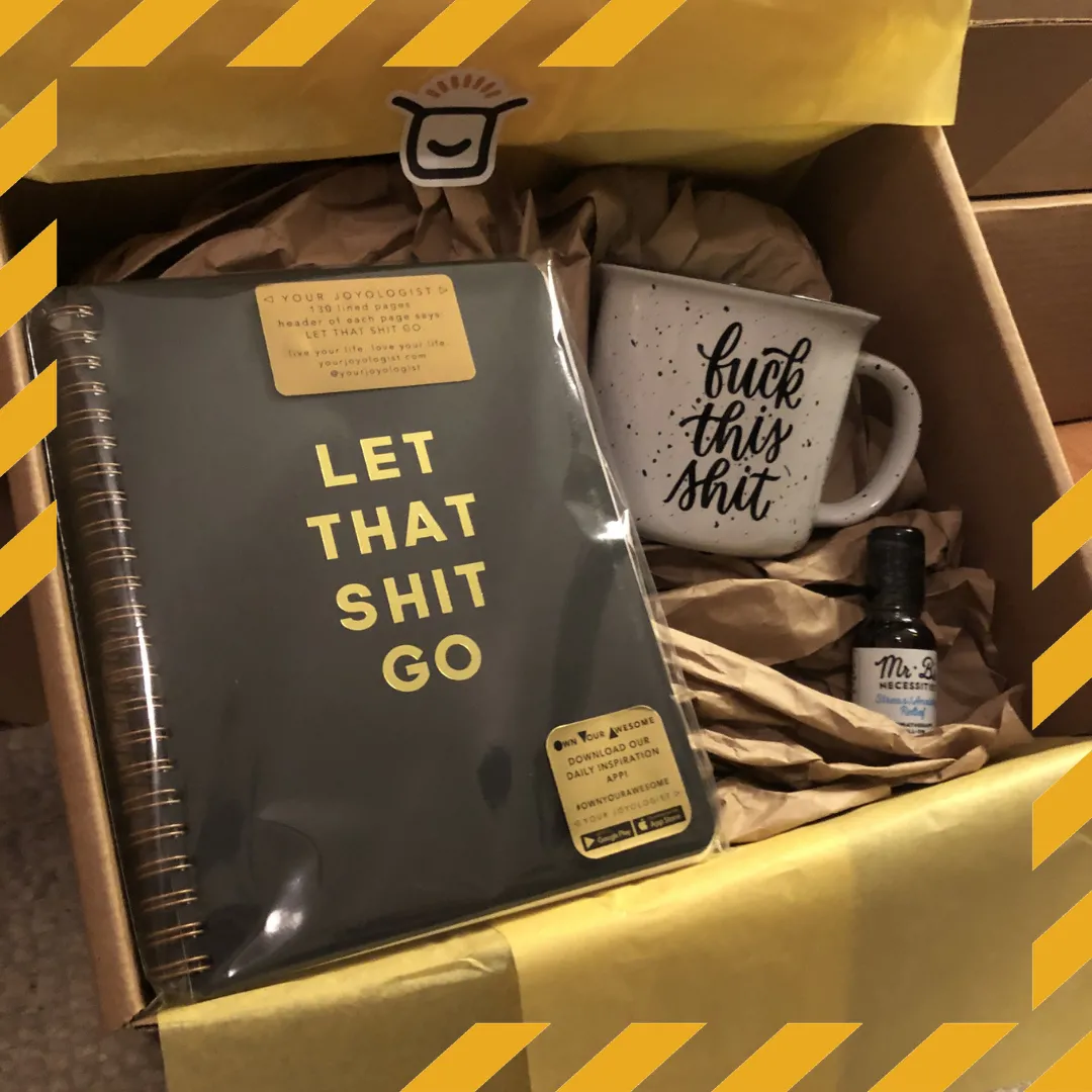 Expletives care package with journal, mug and essential oil.