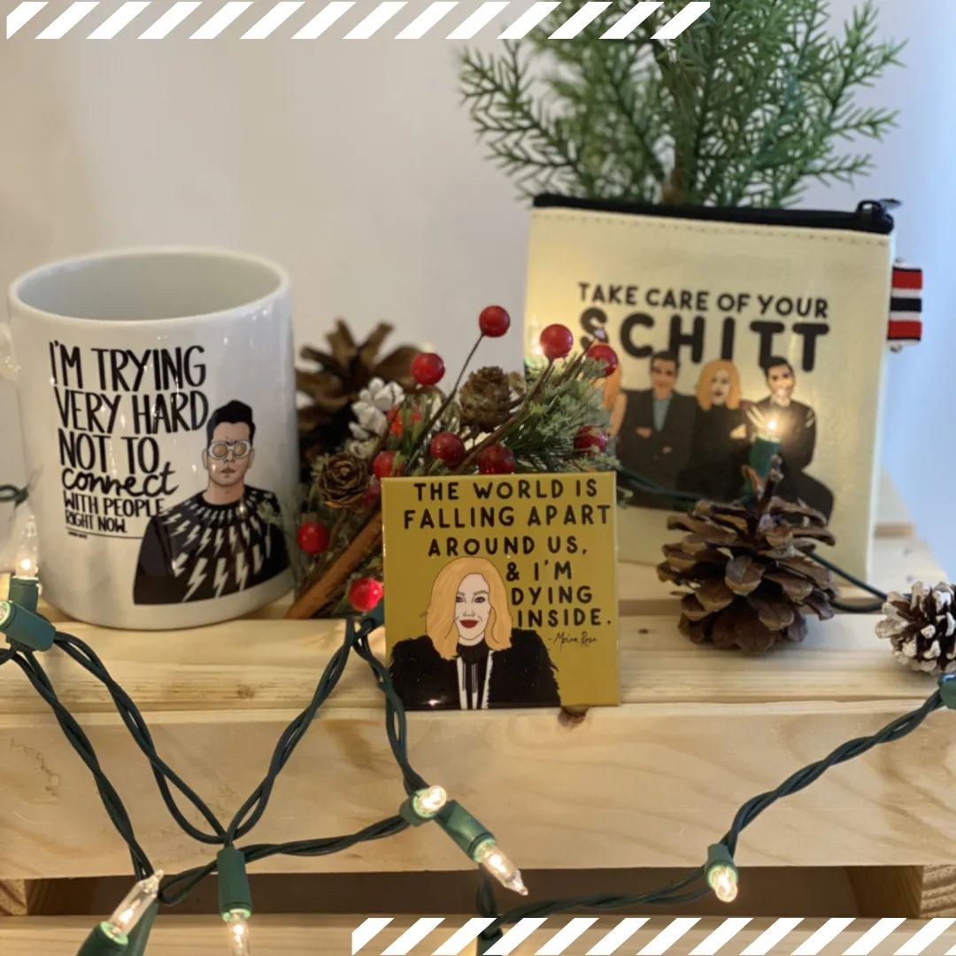 Rose colored outlook care package with Schitt's Creek mug, magnet and zip pouch