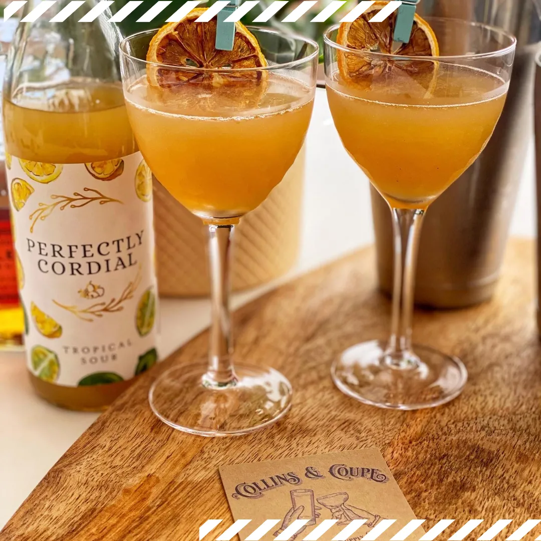 When life gives you lemons care package with Nick & Nora glass set, non-alcoholic tropical sour mix and garnish.