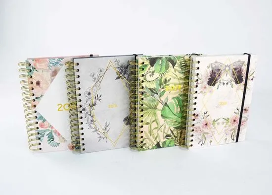 Four floral planners side by side