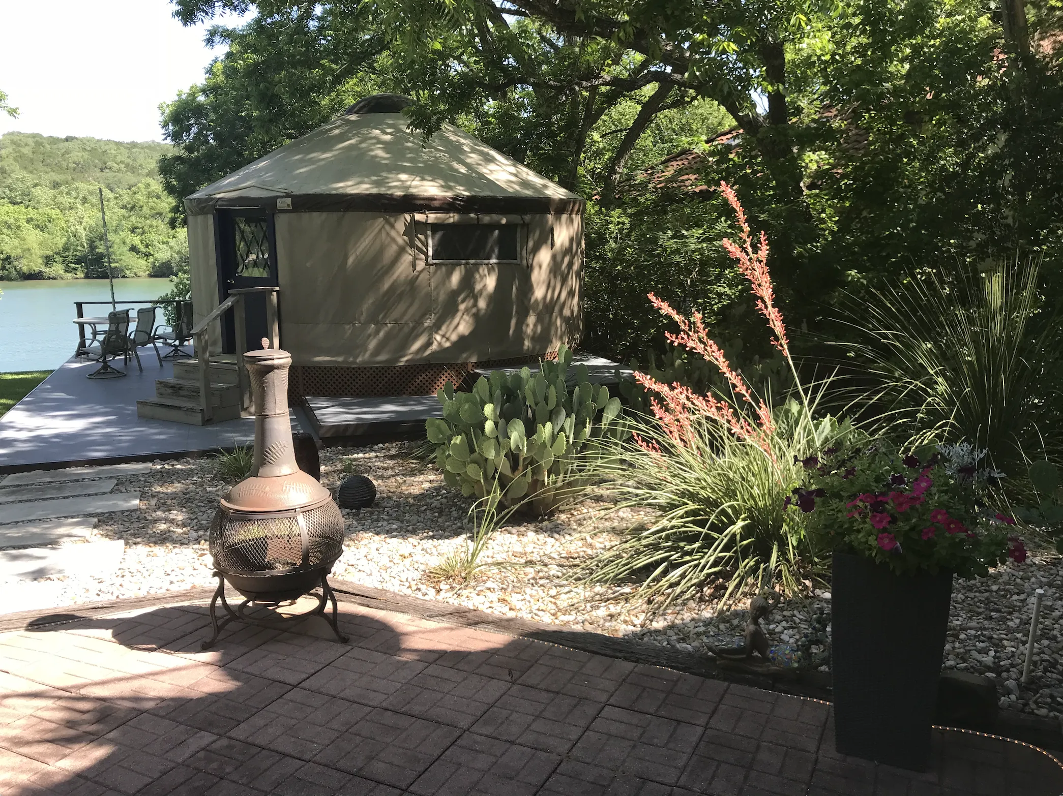 yurt outside in front of the lake