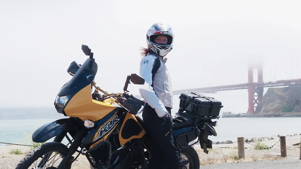 Model, Lori in our Falcon Jacket and Raven Pants with her Kawi KLR650